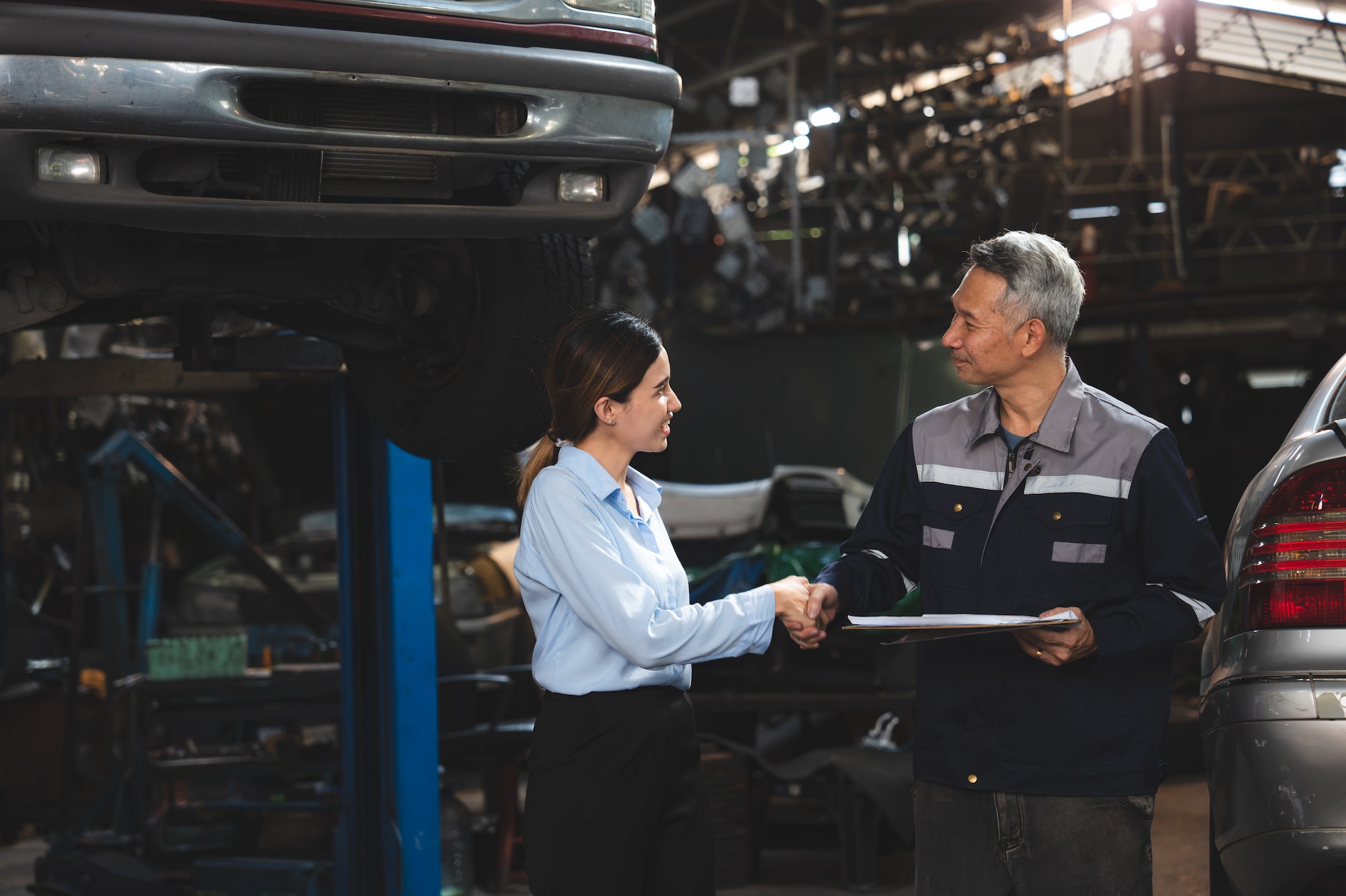 professional male technician mechanic man working to repair maintenance automobile at garage service